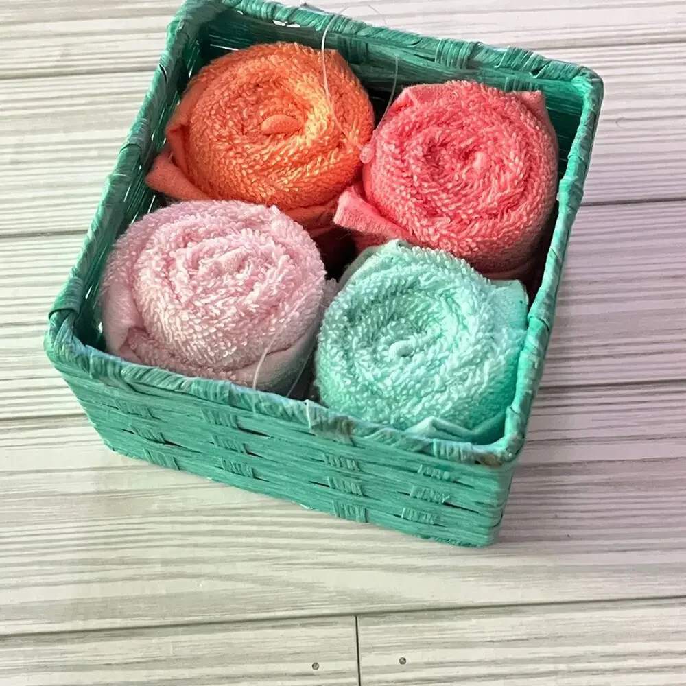 Colorful Rolled Wash Cloths in Basket